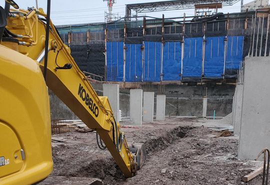 Crain Digging Drain Pipe Tunnels